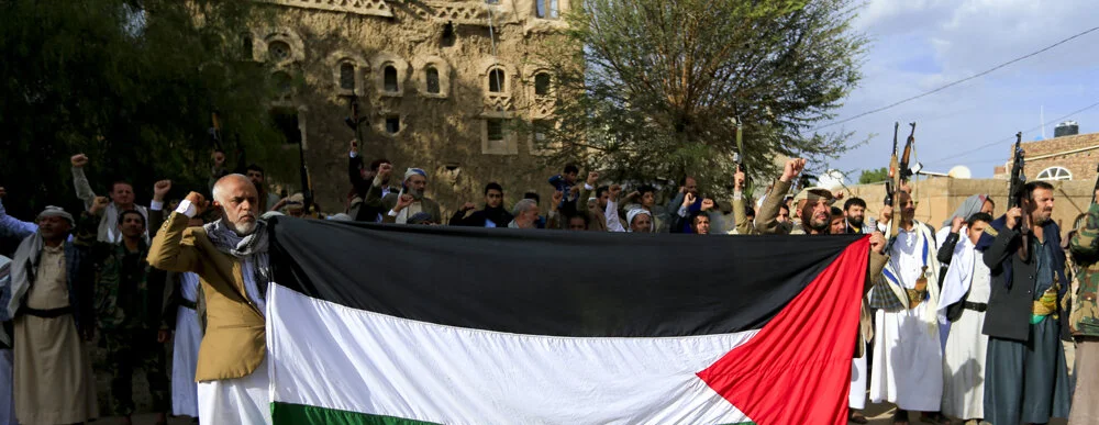 Palestinian boy bids farewell to sister after fatal shooting in Al-Mawasi